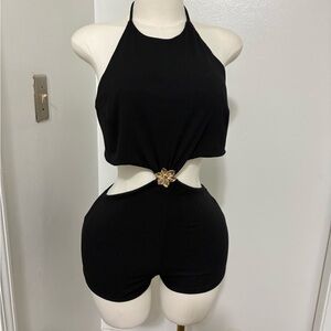 Black Halter Cutout Romper with Gold Floral Accent